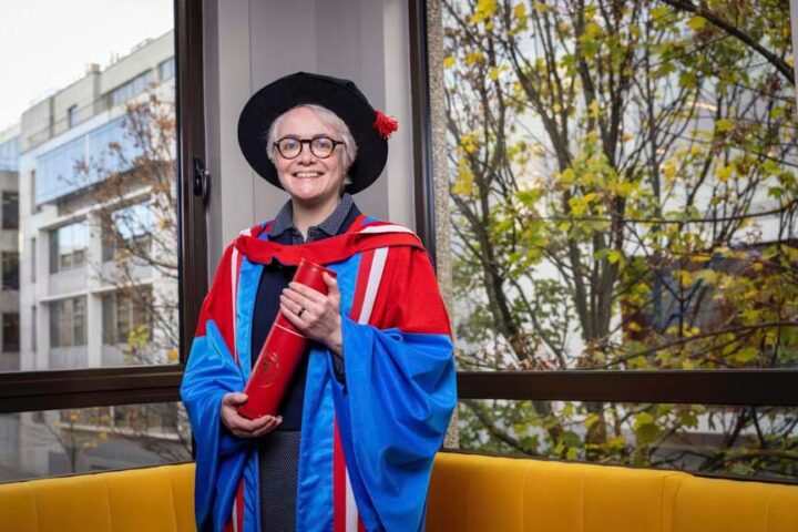 Photo of Mary receiving her doctorate