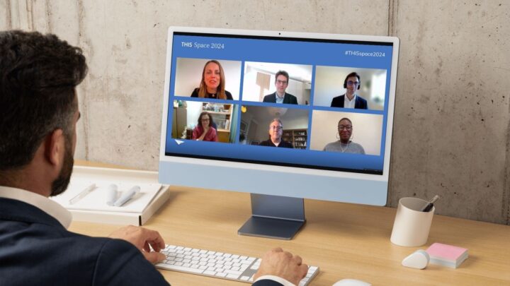 A man watches THIS Space 2024 on his desktop screen